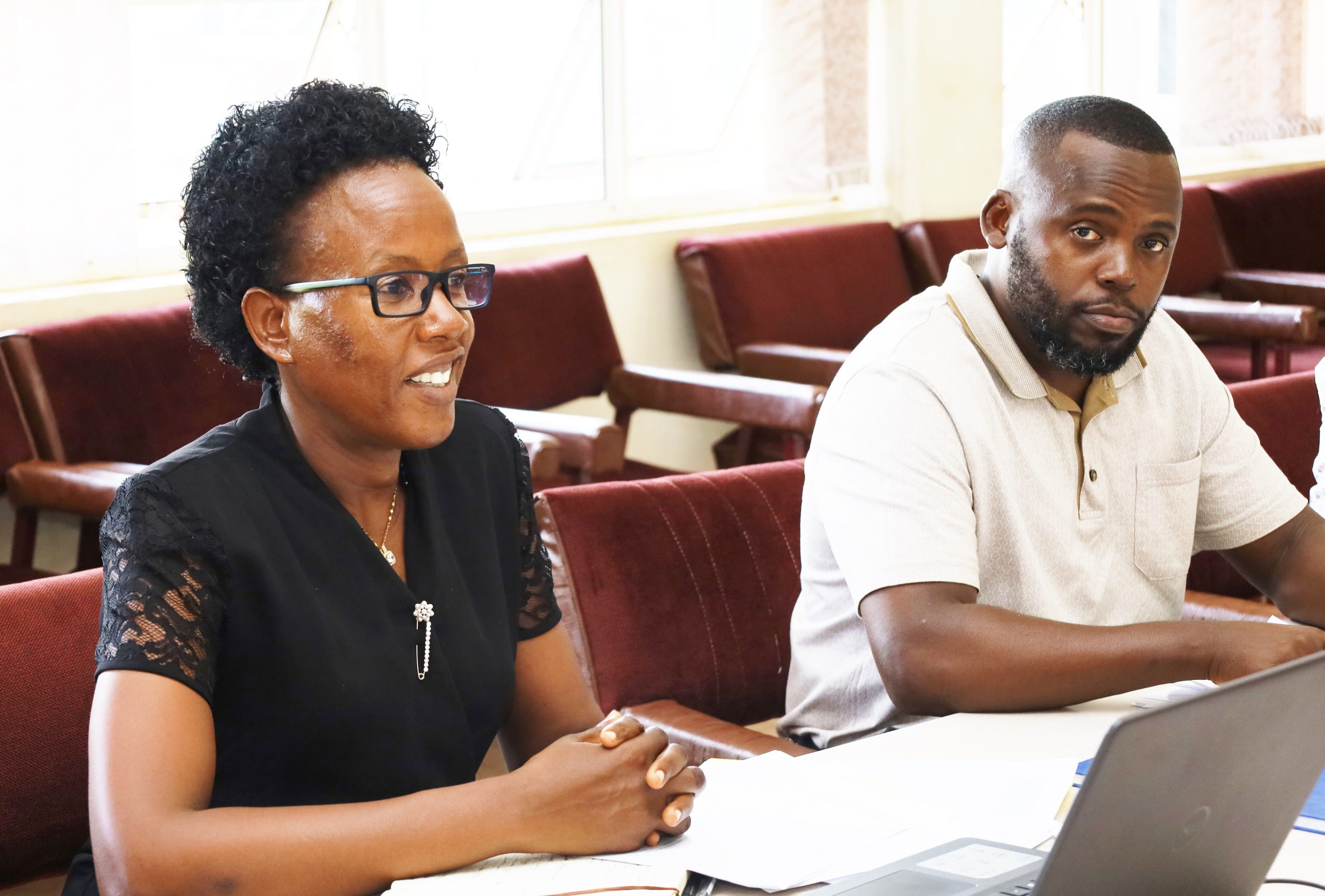 Ms. Susan Mbabazi (Left) and Mr. Eric Tumwesigye (Right) during the Gender Mainstreaming Directorate (GMD)'s consultative meeting with CoCIS Staff on 23rd May 2023 at College Conference Hall, Level 4, Block A, CoCIS, Makerere University, Kampala Uganda.