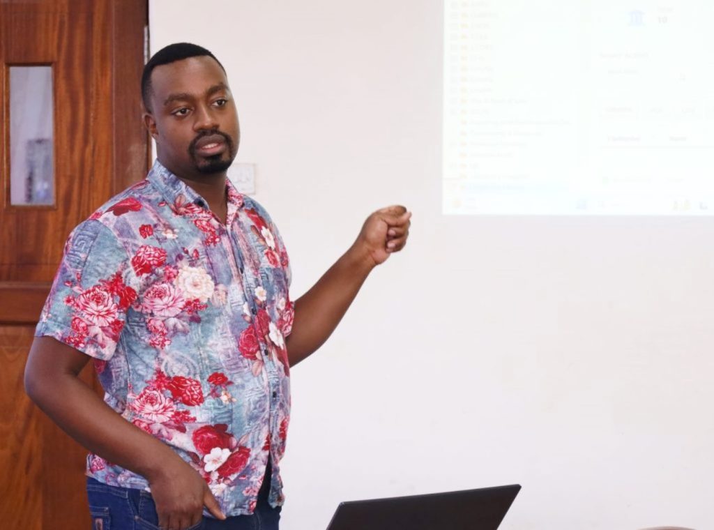 Mr. Joshua Muhumuza demonstrated how the Performance Appraisal tool should be filled through e-HRMS. CoCIS, Makerere University, Kampala Uganda.