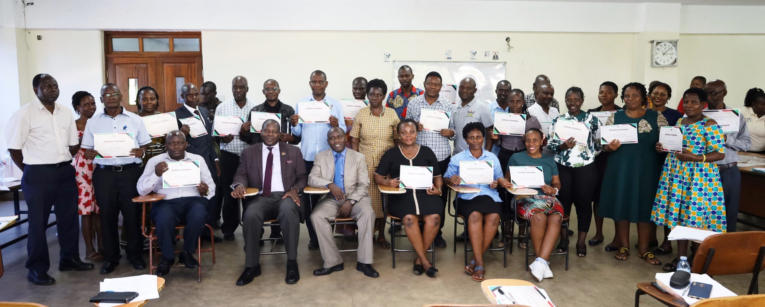 Ag. Director, Directorate of Human Resources, Mr. Lawrence Sanyu (Seated 3rd Left), Principal CoCIS, Prof. Tonny Oyana (Seated 2nd Left) with participants after the training on 12th May 2023. Makerere University, Kampala Uganda.