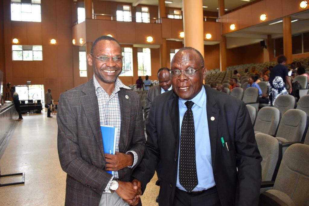 Prof. Kakumba with Prof. Eriabu Lugujjo, former Vice Chancellor of Ndejje University and currently Executive Director of the Uganda Vice Chancellors Forum (UVCF), Yusuf Lule Auditorium, Makerere University, Kampala Uganda.