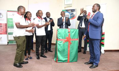 Dr. Cosmas Mwikirize (R) officially launching the MakSol Cooker on behalf of the Minister of Science, Technology and Innovation, Hon. Dr. Monica Musenero Masanza on 14th June 2023 at Makerere University. School of Food Technology, Nutrition and Bioengineering Conference Hall, CAES, Kampala Uganda.