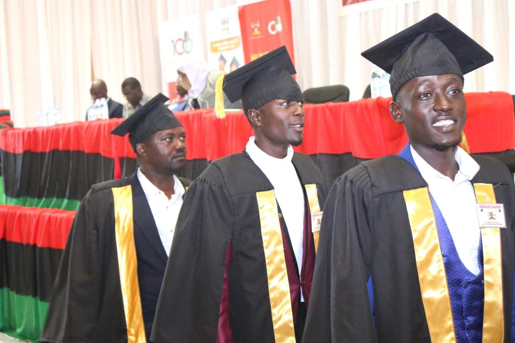 Some of the male ghetto youth prepare to receive their certificates. Yusuf Lule Central Teaching Facility Auditorium, Makerere University, Kampala Uganda.