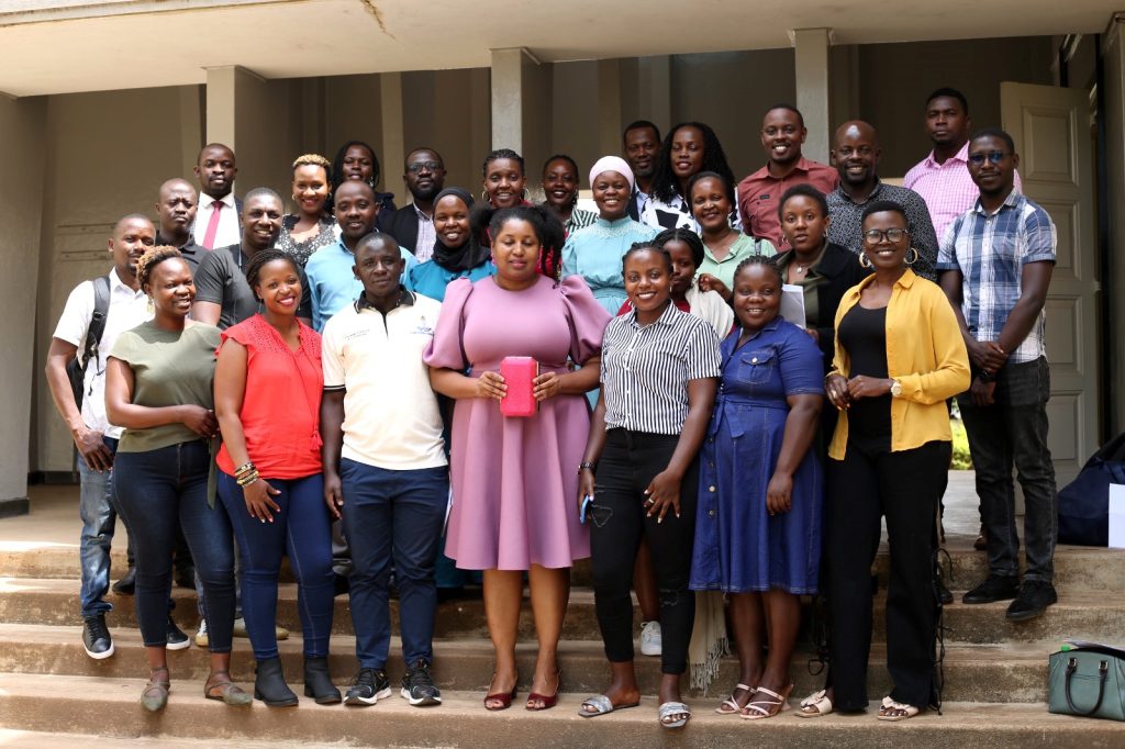 MA students in a group photo with members of the Pioneer Class and the Department of Journalism and Communication Leadership and Staff after the engagement. College of Humanities and Social Sciences (CHUSS), Makerere University, Kampala Uganda.
