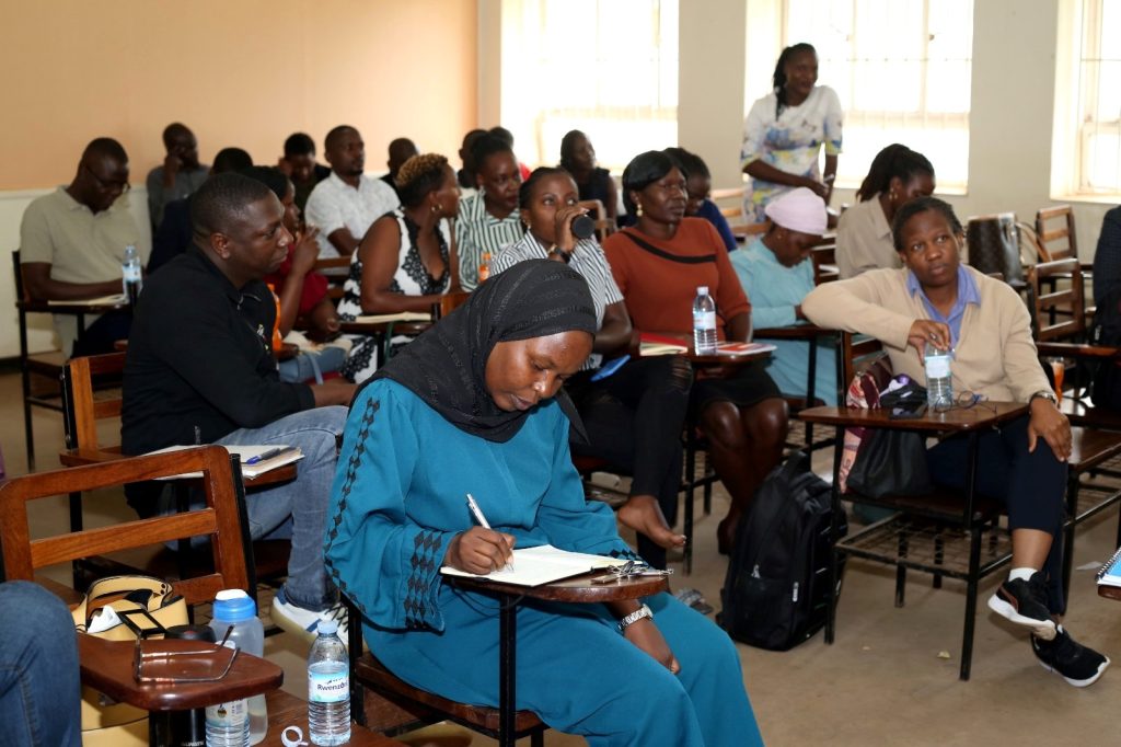 Dr. Aisha Nakiwala, a Senior Lecturer and the Head of Department takes notes during the engagement. College of Humanities and Social Sciences (CHUSS), Makerere University, Kampala Uganda.