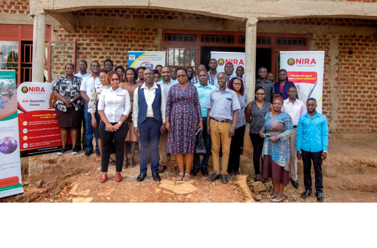 Front Row Left to Right: Senior Registration Officer NIRA-Shalom Kisakye, Wandera Sadala-RDC Iganga District, and COA Representative with stakeholders pose for a photo after the training at MUCHAP offices in Iganga District on 30th May 2023. Makerere University, Kampala Uganda.