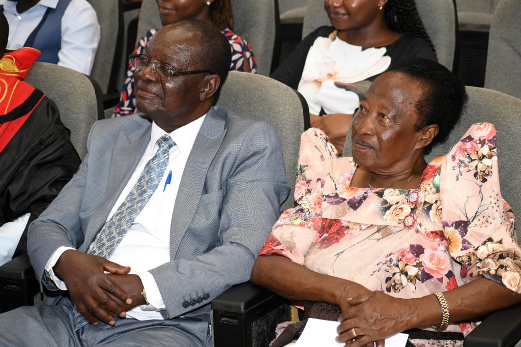 Prof. John H. Muyonga's parents beam as they follow proceedings of their son's Professorial Inaugural Lecture. Yusuf Lule Central Teaching Facility Auditorium, Makerere University, Kampala Uganda.