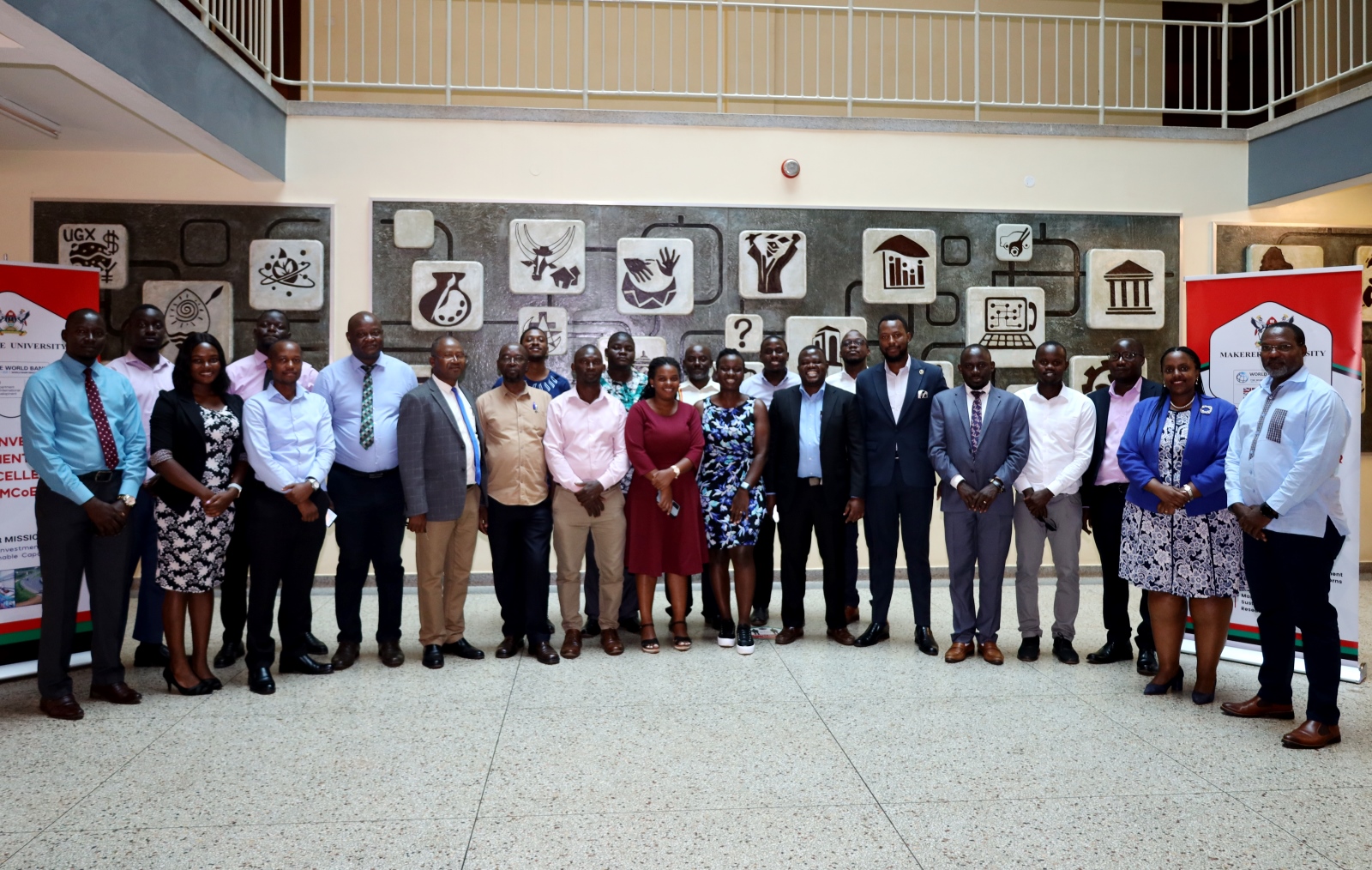 Trainees that attended the post-training evaluation workshop for the Public Investment Management (PIM) Centre of Excellence on 13th July 2023 pose for a group photo. Yusuf Lule Central Teaching Facility, Makerere University, Kampala Uganda. East Africa.