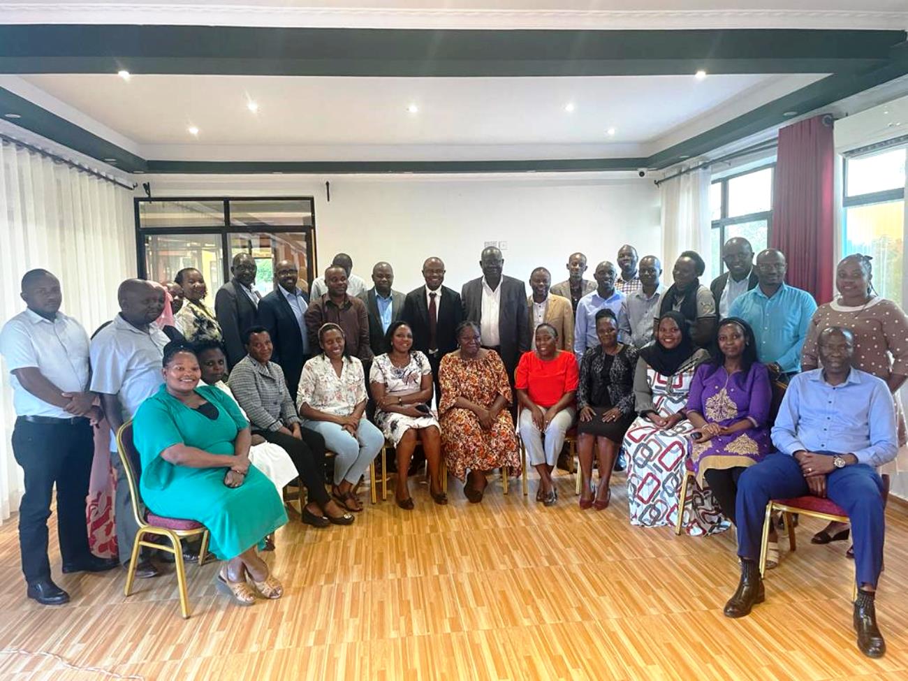 The Principal CoBAMS-Prof. Eria Hisali (Center in tie) with the Dean School of Business-Prof. Godfrey Akileng (To his Left) and School Staff during the retreat held 26th-27th June 2023 in Bunga, Kampala. Uganda