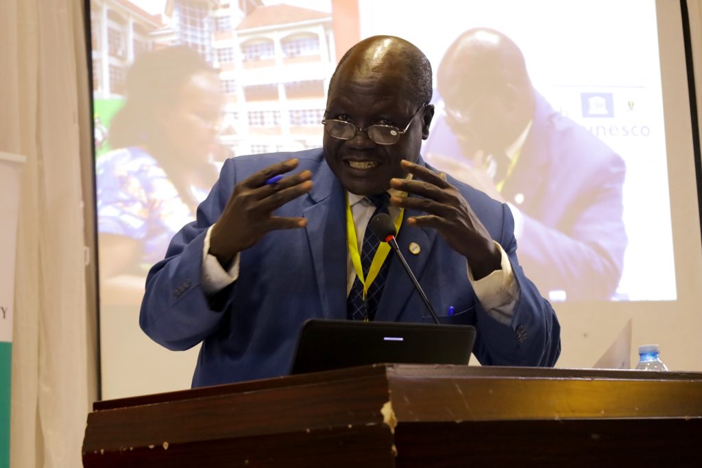 Dr. Dominic Lali Mundrugo-Ogo chaired the session on reflections. Yusuf Lule Central Teaching Facility Auditorium, Makerere University. Kampala Uganda. East Africa.