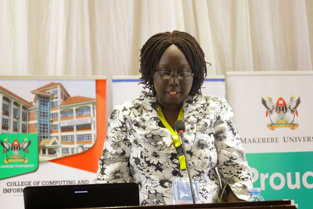 Ms. Rosie Agoi addresses the Seminar. Yusuf Lule Central Teaching Facility Auditorium, Makerere University.