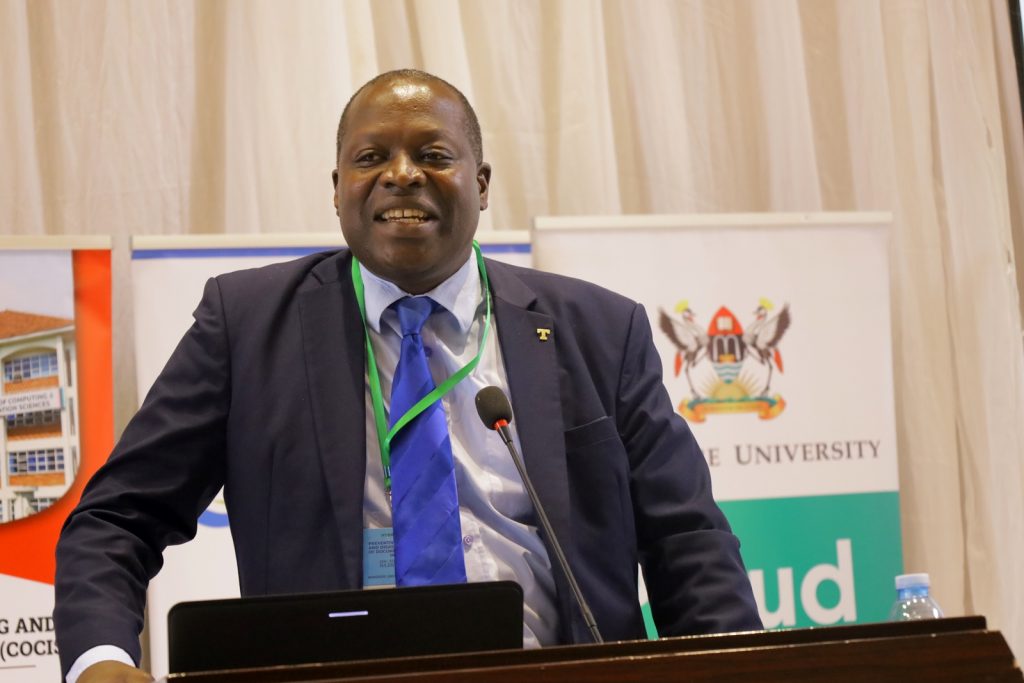 Prof. Tonny Oyana delivers the closing remarks. Yusuf Lule Central Teaching Facility Auditorium, Makerere University. Kampala Uganda. East Africa.