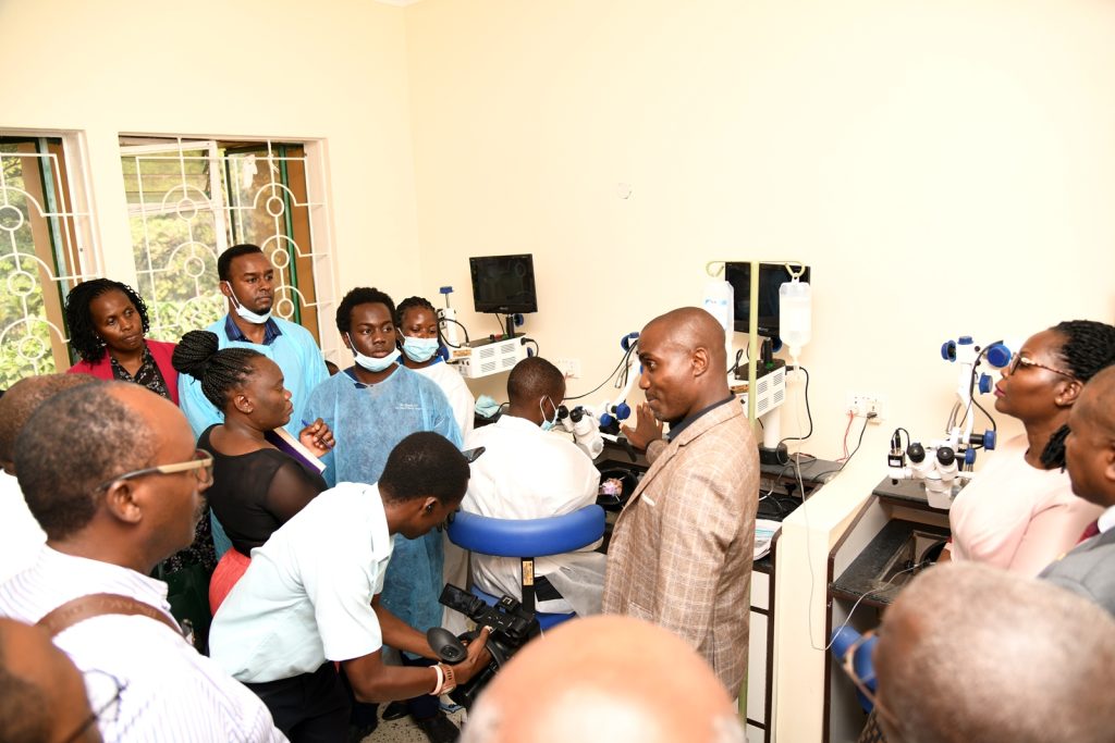 Dr. Christopher Ndoleriire gives the partners a guided tour of the Temporal Bone Laboratory. Makerere University Hospital, Kampala Uganda, East Africa.