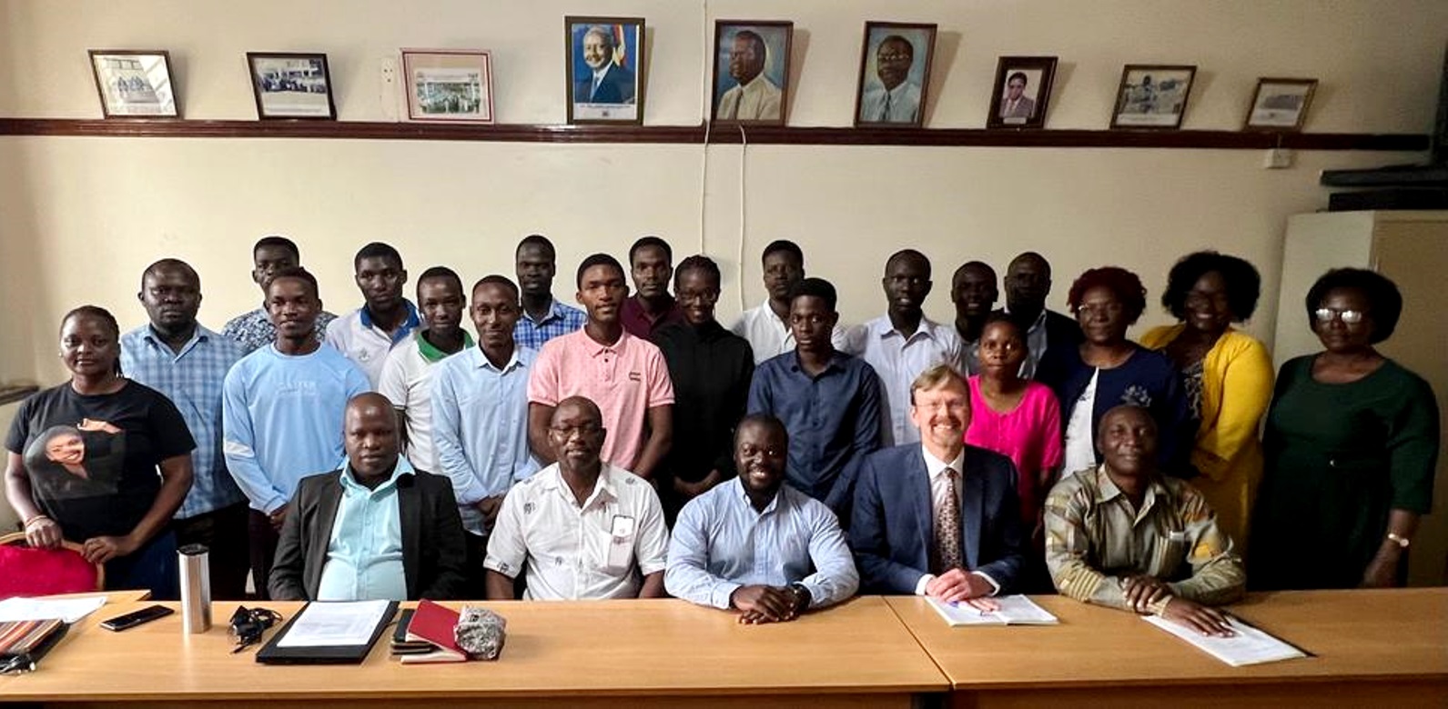 Seated Right-Left: Prof. Robert Tweyongyere, Dr. Richard Paley, Mr. Andrew Wokorac Joseph, Dr. John Walakira and another official with staff and students (standing) after the meeting on 8th August 2023, CoVAB, Makerere University. Kampala Uganda, East Africa.