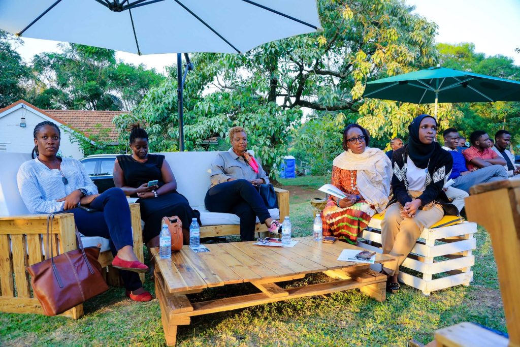 Part of the audience at the Ekyooto follows proceedings. JNLC Gardens, Makerere University. Kampala Uganda East Africa.