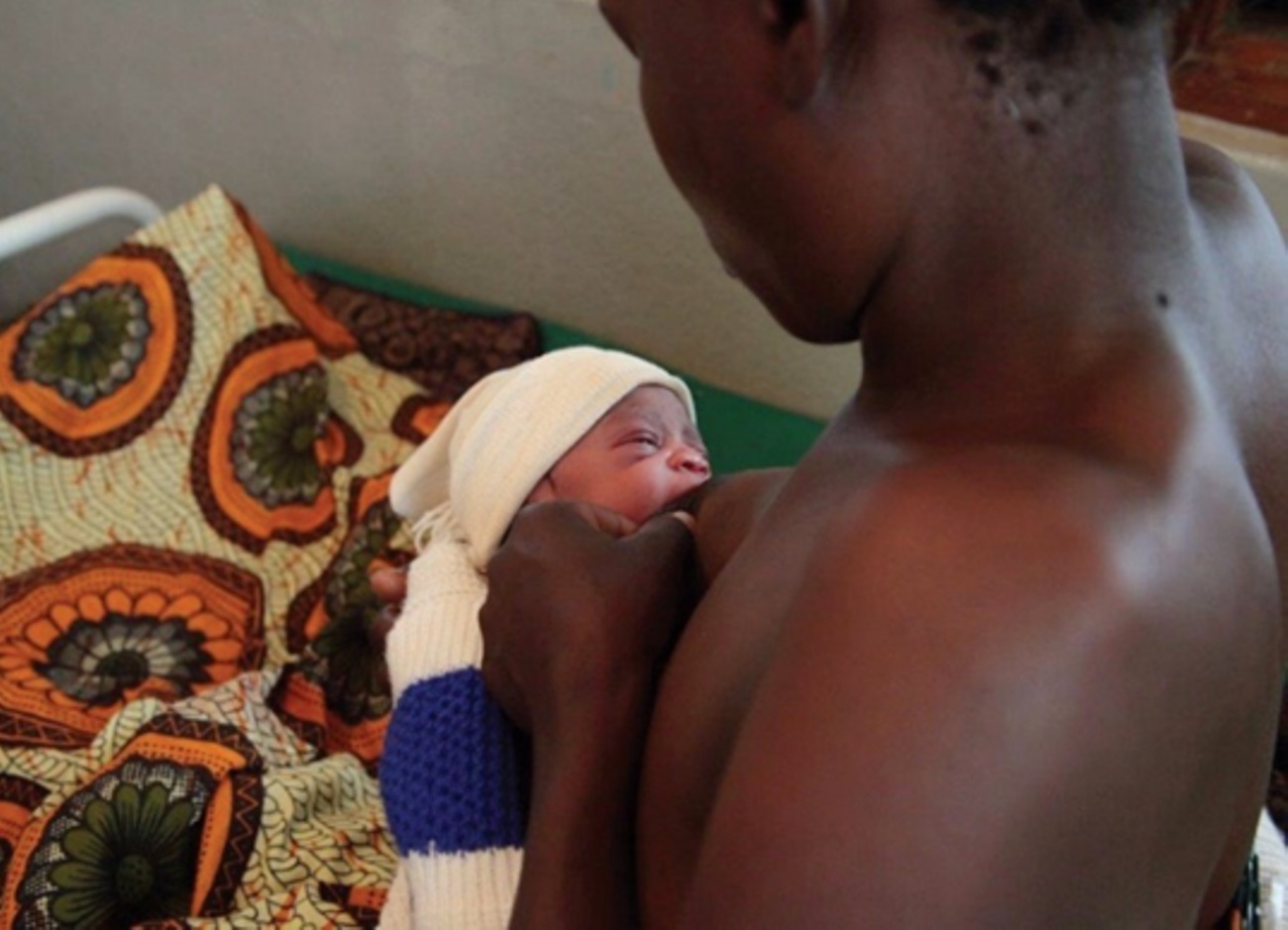 A mother breastfeeds her newborn baby. Photo MNCH. MakSPH, CHS, Makerere University, Kampala Uganda, East Africa