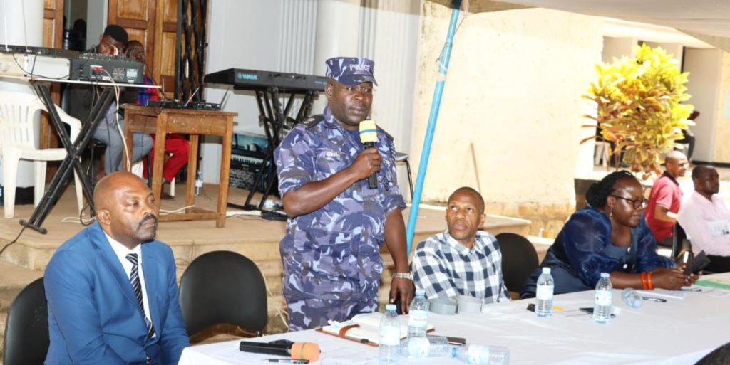 Superintendent of Police, Daniel Okello from Uganda Police Force speaking on security issues. Arts Quadrangle, College of Humanities and Social Sciences (CHUSS), Makerere University, Kampala Uganda. East Africa.