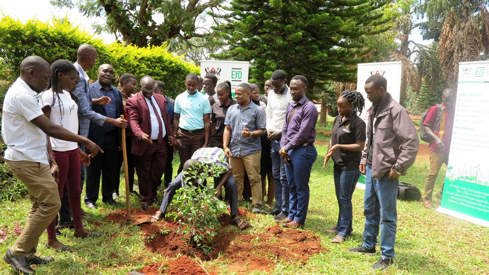 Dr. John Sseruyange (4th Left) and Canon Edward Musingye-CAO Kiboga District (5th Left) with officials and students during the donation of 800 umbrella trees by CoBAMS and the Environment for Development Project (EfD) at the District Headquarters on 21st September 2023. Uganda, East Africa.