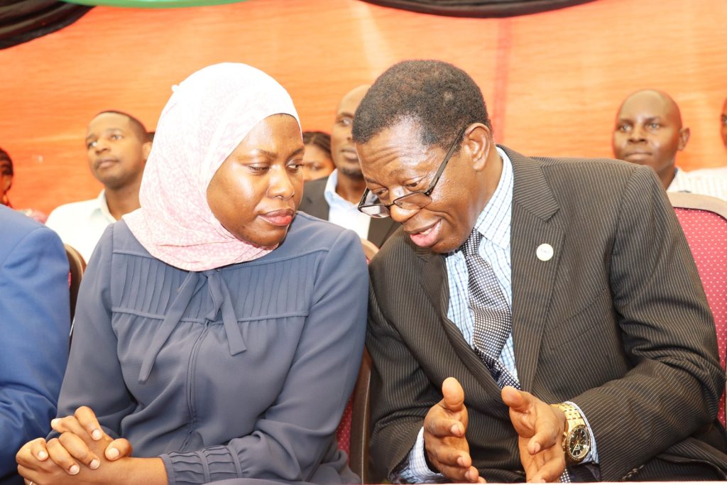 Dr. Aminah Zawedde (Left) and Prof. Buyinza Mukadasi (Right) interact before the Ocular technology launch. College of Computing and Information Sciences (CoCIS), Makerere University, Kampala Uganda, East Africa.
