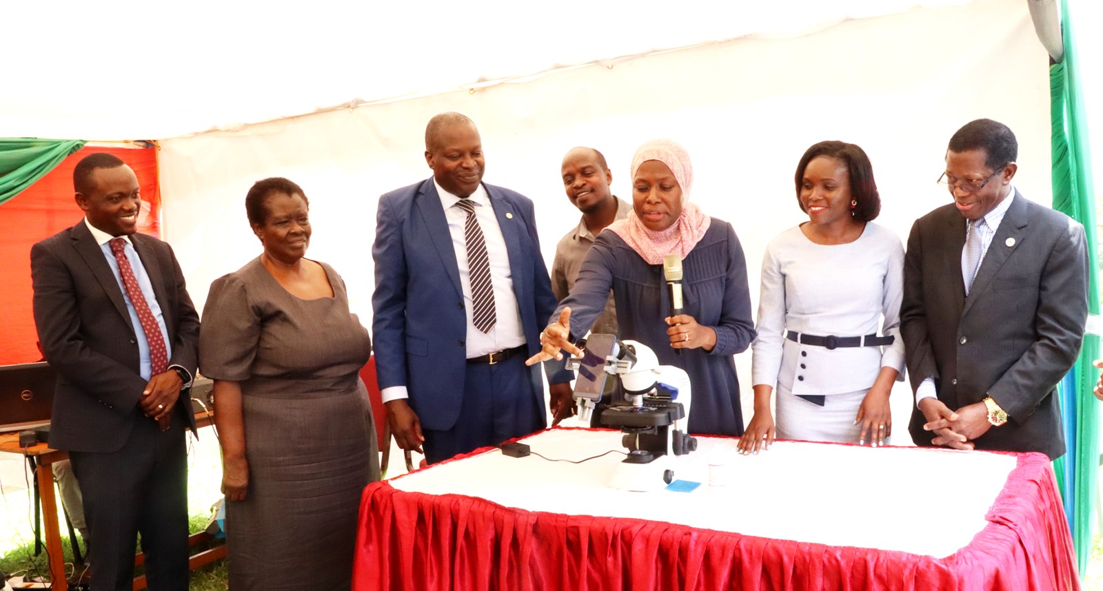 Permanent Secretary, MoICT & NG, Dr. Aminah Zawedde (3rd Right) flanked by Prof. Tonny Oyana (3rd Left) and the PI-Dr. Rose Nakasi Kiire (2nd Right) launches the Mak Ocular innovation on 13th September 2023 at CoCIS. Left to Right are Mr. Galandi Tony Kiire, Mrs. Elizbeth Gabona, Prof. Buyinza Mukadasi and a MakSPH official (Rear). College of Computing and Information Sciences (CoCIS), Makerere University, Kampala Uganda, East Africa.