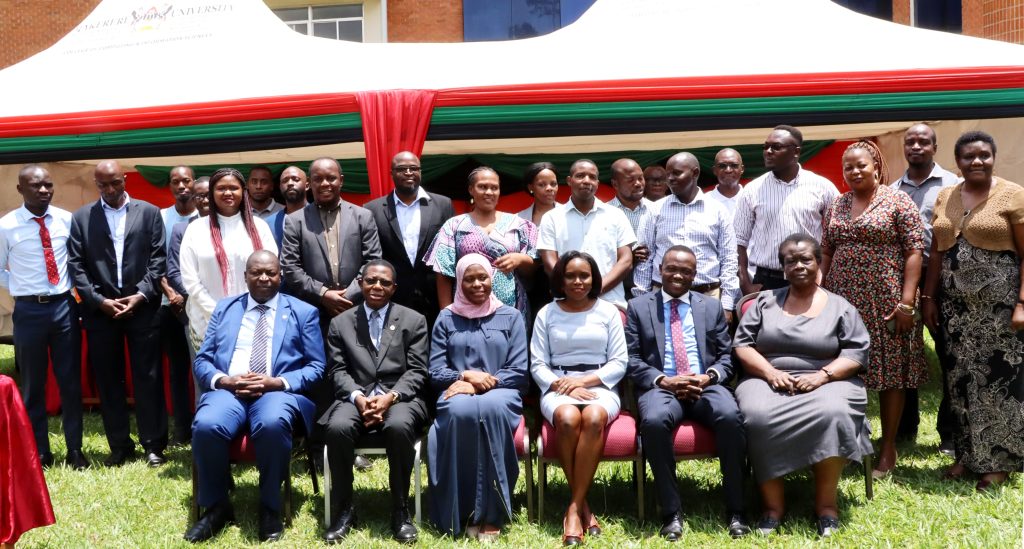 Officials posing for a group photo with the Guest of Honour-Dr. Aminah Zawedde (Seated 3rd Left) after the launch of the Ocular technology. College of Computing and Information Sciences (CoCIS), Makerere University, Kampala Uganda, East Africa.