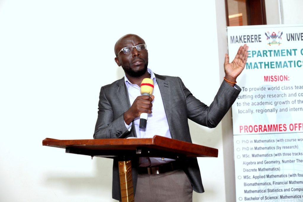 The Head, Department of Mathematics at Makerere University, Prof. Godwin Kakuba welcoming participants to the workshop. College of Engineering, Design, Art and Technology (CEDAT), Conference Hall, Makerere University, Kampala Uganda, East Africa.