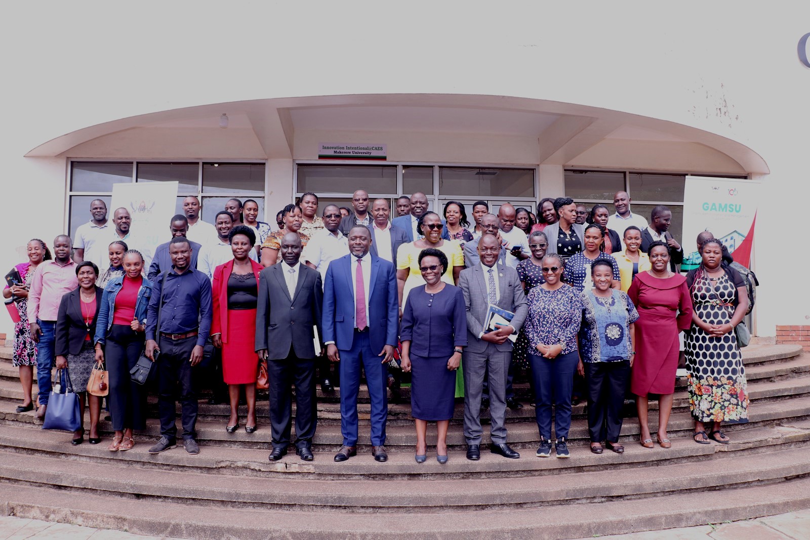 The University Secretary – Mr. Yusuf Kiranda (7th right), Head GAMSU – Prof. Sylvia A.N. Nannyonga – Tamusuza (6th right), deputy University Bursar – Mr. Lubowa Gyaviira (5th R), Mr. Patrick Akonyet (8th Right) and other officials posing for a photo moment with the Principal Investigators (PIs) and Project Administrators at the GAMSU workshop on September 14, 2023, Makerere University. 14th September 2023, The Conference Hall, School of Food Technology, Nutrition and Bioengineering, College of Agricultural and Environmental Sciences (CAES), Makerere University, Kampala Uganda, East Africa.