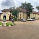 The Nkrumah Hall and Parking Lot, Makerere University with Osagyefo Dr. Kwame Nkrumah's Monument in the foreground. Kampala Uganda, East Africa.