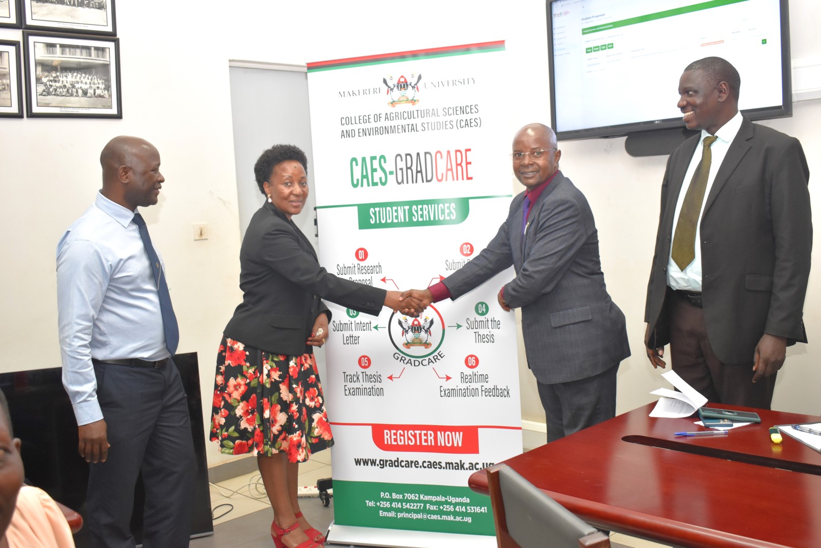 The Director DRGT-Prof. Edward Bbaale (2nd Right) launches the CAES GRADCARE Management System on behalf of the DVCAA on 17th October 2023. Right is Dr. Cyprian Misinde, Director Quality Assurance, Second Left is the Principal of CAES, Prof. Gorettie Nabanoga, and Left is the Deputy Principal, Prof. Yazhidi Bamutaze. CAES Conference Hall, Makerere University. Kampala Uganda, East Africa.