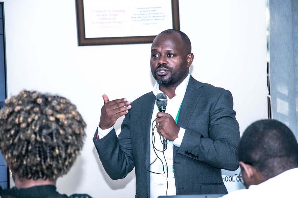 Dr. John Bosco Isunju, a Lecturer at MakSPH and CARTA Focal Person Makerere University presenting the CARTA theory of change. Makerere University School of Public Health, Plot 28 House 30, Upper Kololo Terrace, Kampala Uganda, East Africa.