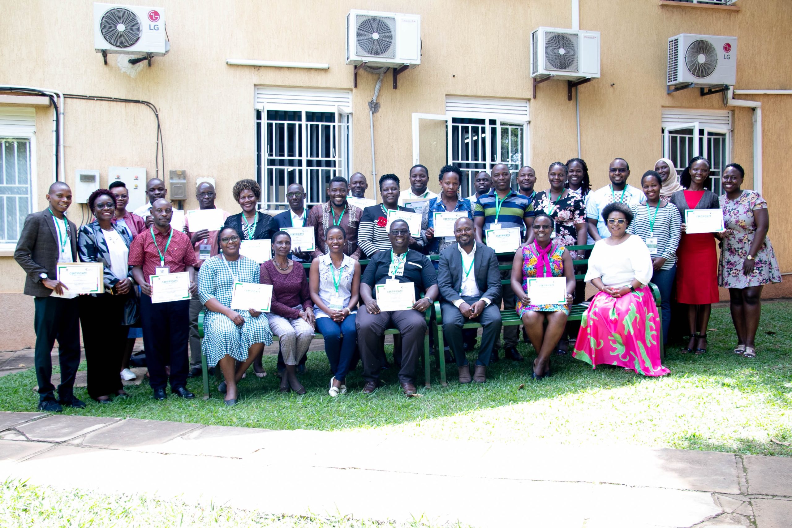 Trainees and Facilitators in a group photo after the Training of Trainers (ToT) Academic, Professional and Administrative staff -APAS course. Makerere University School of Public Health, Plot 28 House 30, Upper Kololo Terrace, Kampala Uganda, East Africa.