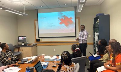 Dr. Caesar Jjingo (Standing) makes his presentation at the South-East African Languages and Literature Forum at the University of Florida, 29th-30th September 2023.