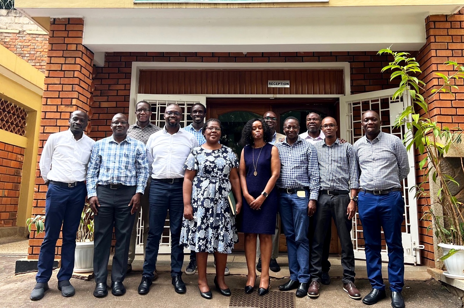 The Director, Dr. Alice Namale (4th Left) with teams from CDC Kenya, CDC Uganda and MakSPH-METS after the debrief meeting at METS offices. Makerere University School of Public Health-METS, Kololo, Kampala Uganda, East Africa.