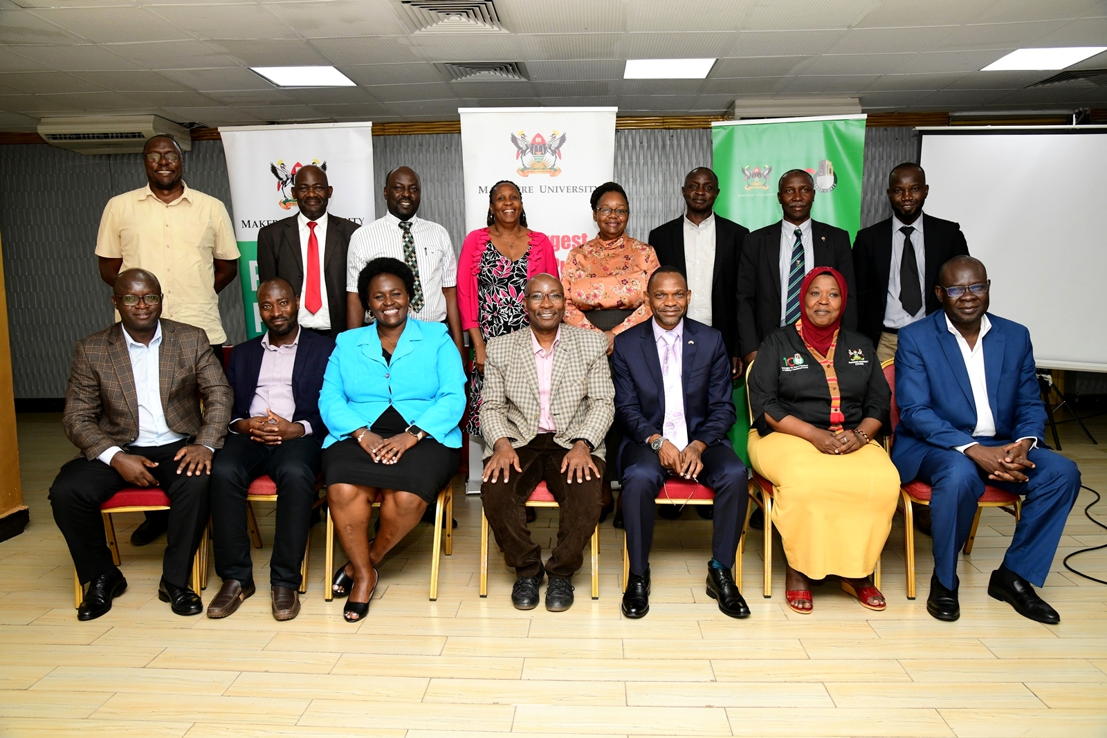 Seated: The DVCAA & Patron MUDF-Prof. Umar Kakumba (3rd R), with the Chairperson-Prof. Arthur K. Tugume (C), Vice Chairperson-Prof. Saudah Namyalo and Members L-R; Dr. Justus Twesigye, Dr. Martin Baluku, Dr. Claire Mugasa and Prof. Godfrey Akileng as well as Deans and Directors (Standing) at the Forum on 28th September 2023, Hotel Africana, Kampala. Uganda, East Africa.