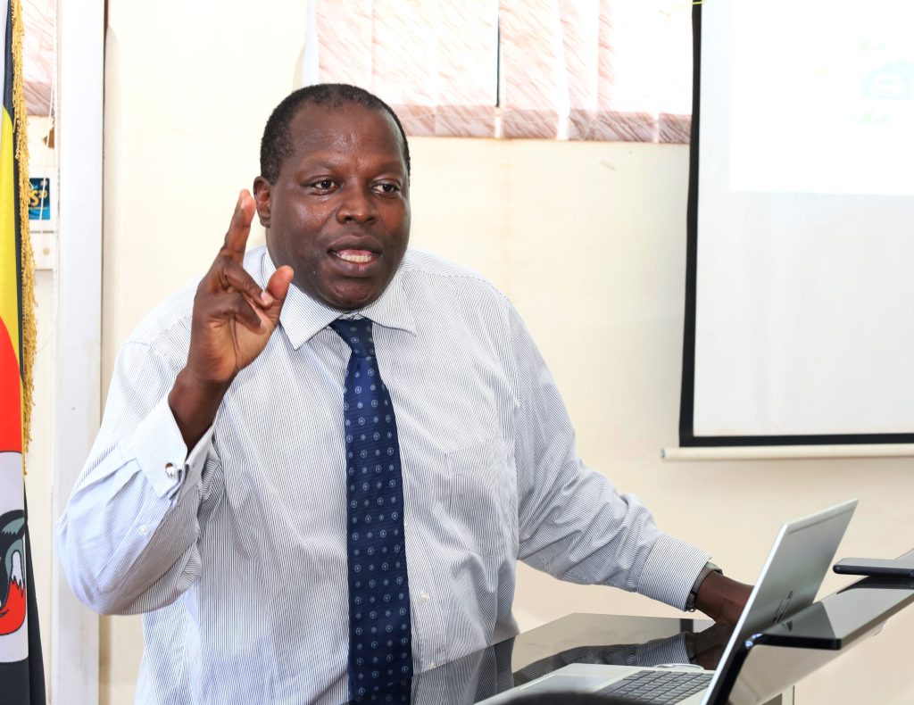 Prof. Tonny Oyana presiding over the dissemination workshop. College of Computing and Information Sciences (CoCIS), Makerere University. Kampala Uganda, East Africa. 