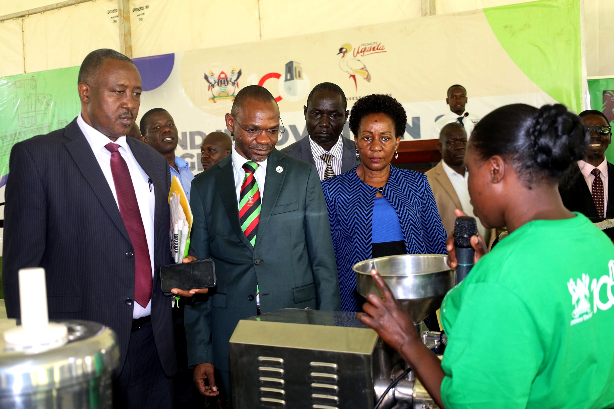 Left to Right: Mr. Steven Byantwale Tibeijuka who represented Hon. Frank Tumwebaze, DVCAA-Prof. Umar Kakumba, Ag. Director Internal Audit-Mr. Patrick Akonyet and Principal CAES-Prof. Gorettie Nabanoga with other officials during a tour of the exhibition at the Freedom Square, Makerere University.