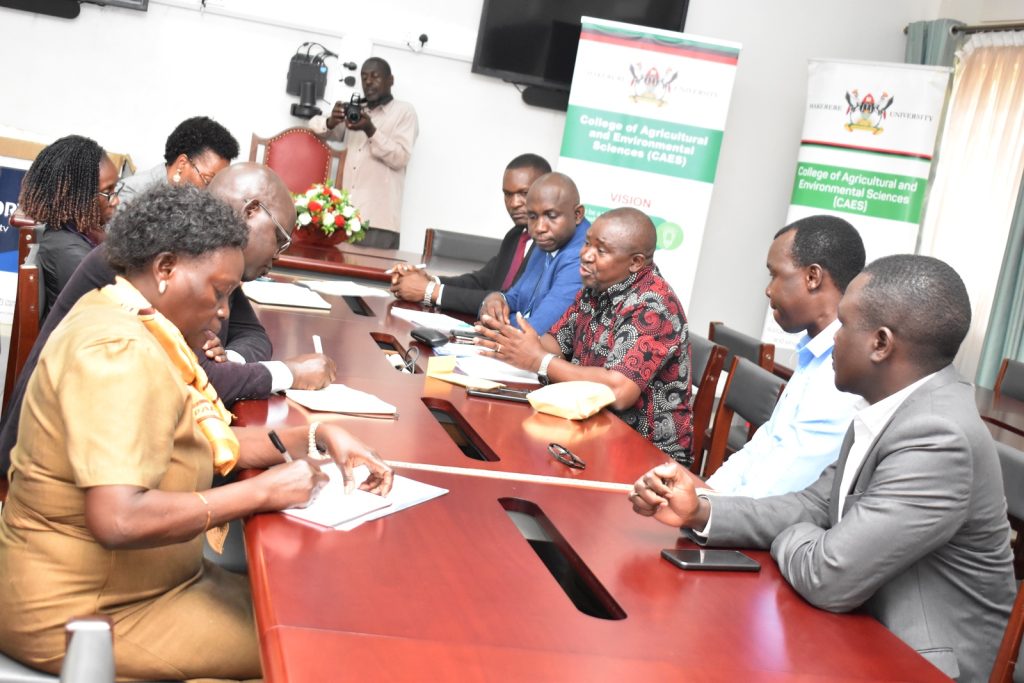 Prof. Nelson Turyahabwe (3rd R) presents his handover report. 13th November 2023, Conference Room, CAES, Makerere University, Kampala Uganda, East Africa.