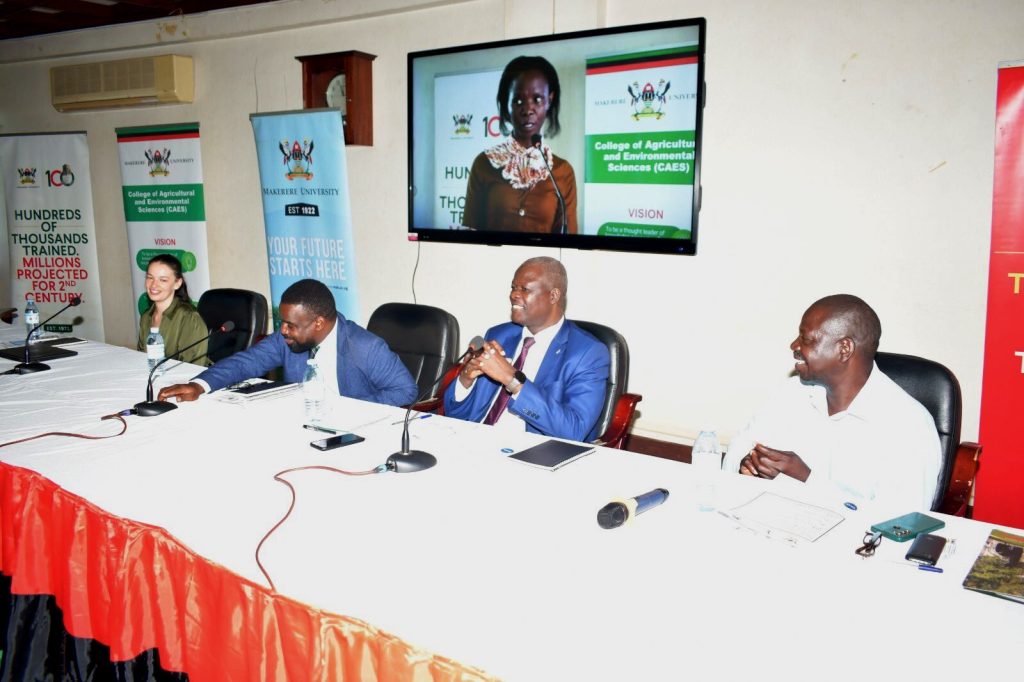 Assoc. Prof. Robert Wamala (2nd L) prepares to make his remarks as Left to Right: Ms. Nele Vahrenhorst, Prof. John Tabuti and Assoc. Prof. Vincent Muwanika share a light moment. Strengthening Education and Research Capacity for Enhancing Biodiversity Conservation and Sustainable Natural Resources Use Project Kick Off Workshop, 16th November 2023, Senate Conference Hall, Makerere University, Kampala Uganda, East Africa.