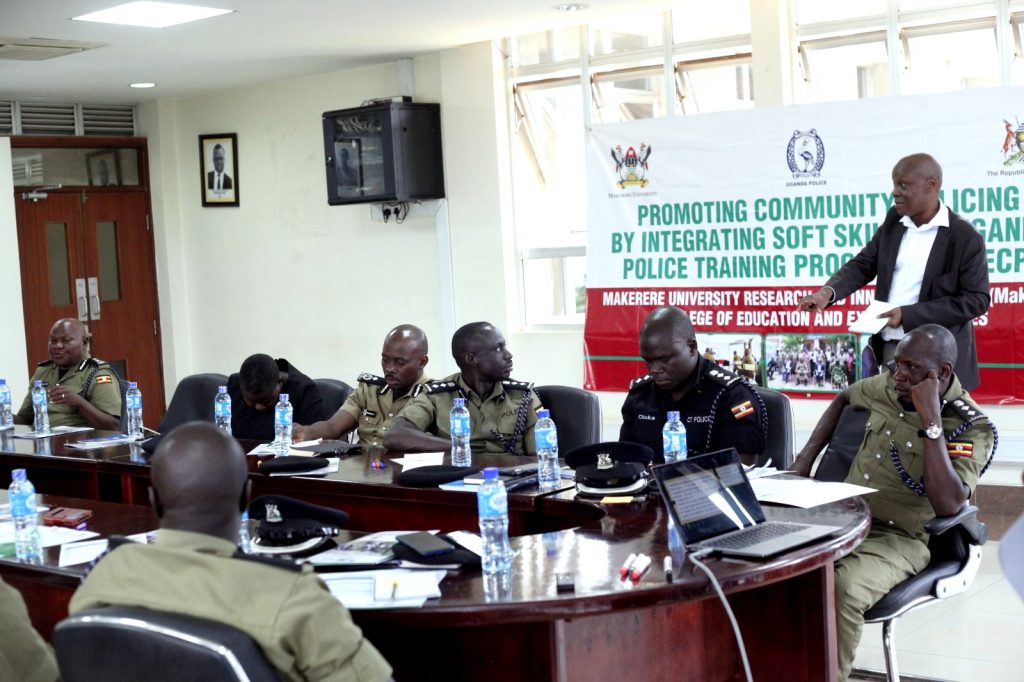 Dr. Badru Musisi (Standing) makes his presentation. Makerere University Research and Innovations Fund (Mak-RIF) “Promoting community policing by integrating soft skills in Uganda Police training" program engagement, November 2023, Uganda Police Force Headquarters, Naguru, Kampala, Uganda, East Africa.