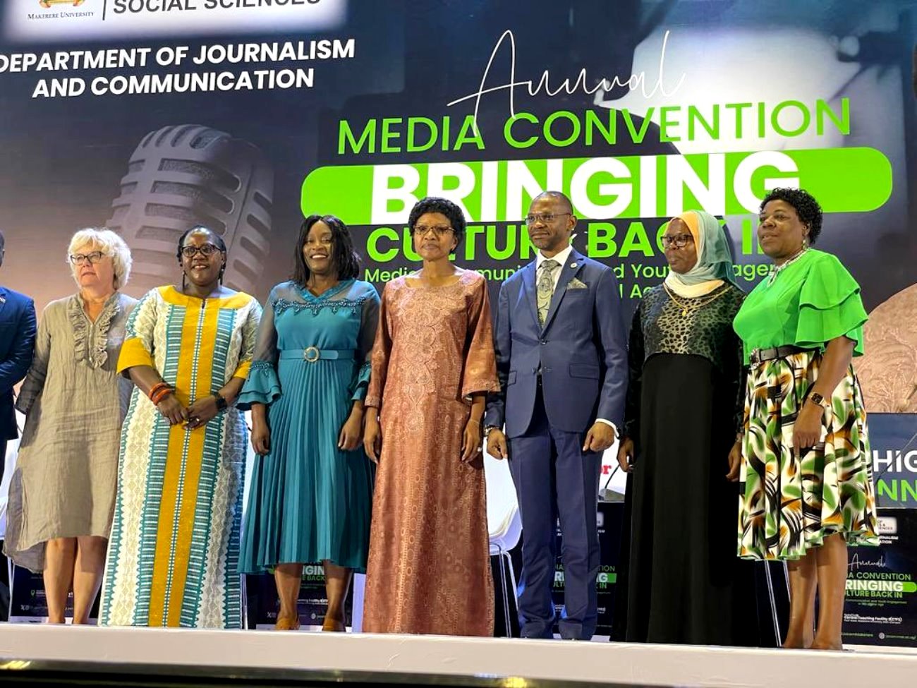 Ms. Judy Kamanyi who represented HRH Sylvia Nagginda the Nnabagereka (C) with DVCAA-Prof. Umar Kakumba (3rd R), Principal CHUSS-Prof. Josephine Ahikire (2nd R), Head DJC-Dr. Aisha Nakiwala (2nd R), Keynote Speaker-Prof. Elizabeth Lubinga Nviri (3rd L), Prof. Goretti Linda Nassanga (R) and other officials at the Annual Media Convention on 12th October 2023 at Makerere University. Kampala Uganda, East Africa.