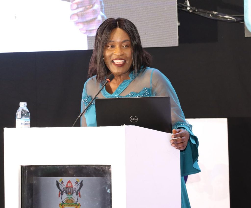 Prof. Elizabeth Lubinga delivering her keynote address. Annual Media Convention, 12th October 2023, Yusuf Lule Central Teaching Facility Auditorium, Makerere University, Kampala Uganda, East Africa.