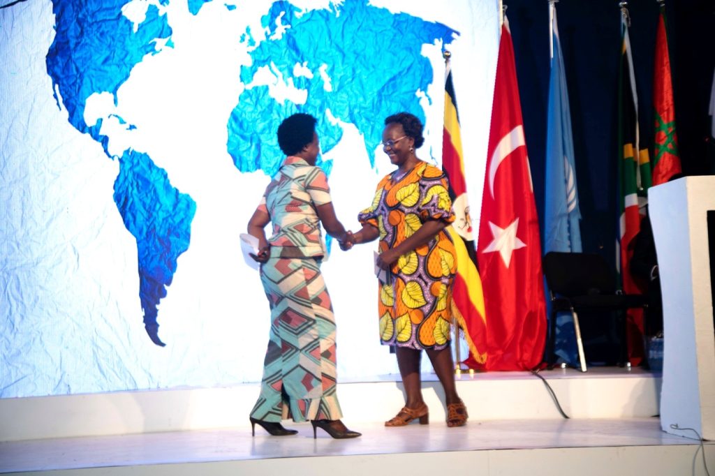 Dr. Pamela Khanakwa (Right) receives the UN Resident Coordinator, Ms. Susan Ngongi Namondo, to the Anthems of the World Stage on 31st October 2023. Anthems of the World Concert, Yusuf Lule Central Teaching Facility Auditorium, Makerere University, Kampala Uganda, East Africa.