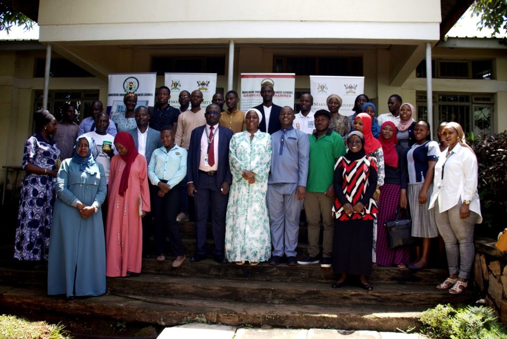 Participants in the research dissemination pose for a group photo. Kampala Uganda, East Africa.