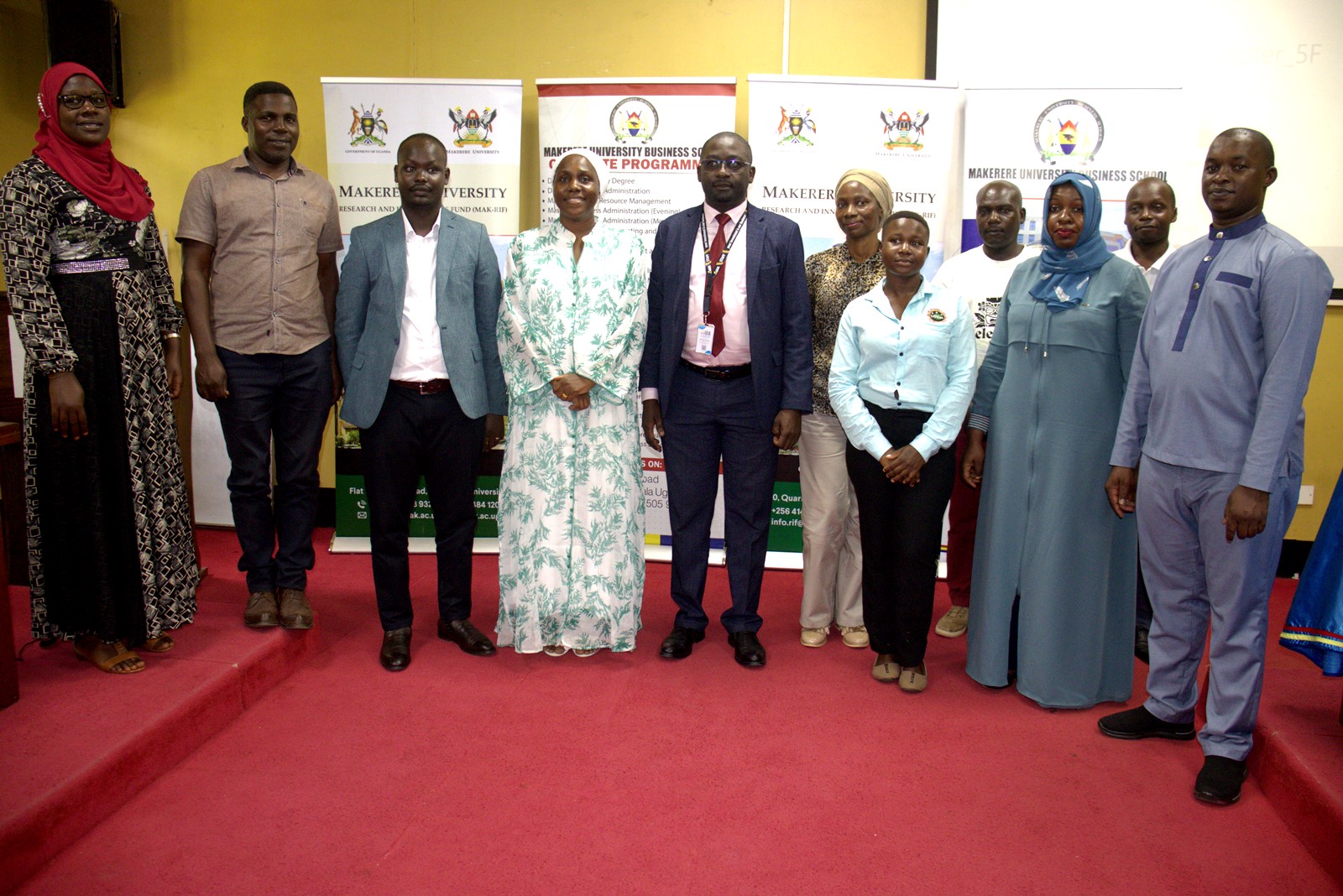 The Project Principal Investigator-Dr. Saadat Kimuli Nakyejwe (4th L), Co-Principal Investigator-Dr. Kasimu Sendawula (R) and MakRIF's Mr. Ezra Byakutangaza (3rd L) with other officials at the research dissemination on 9th November 2023. Kampala Uganda, East Africa.