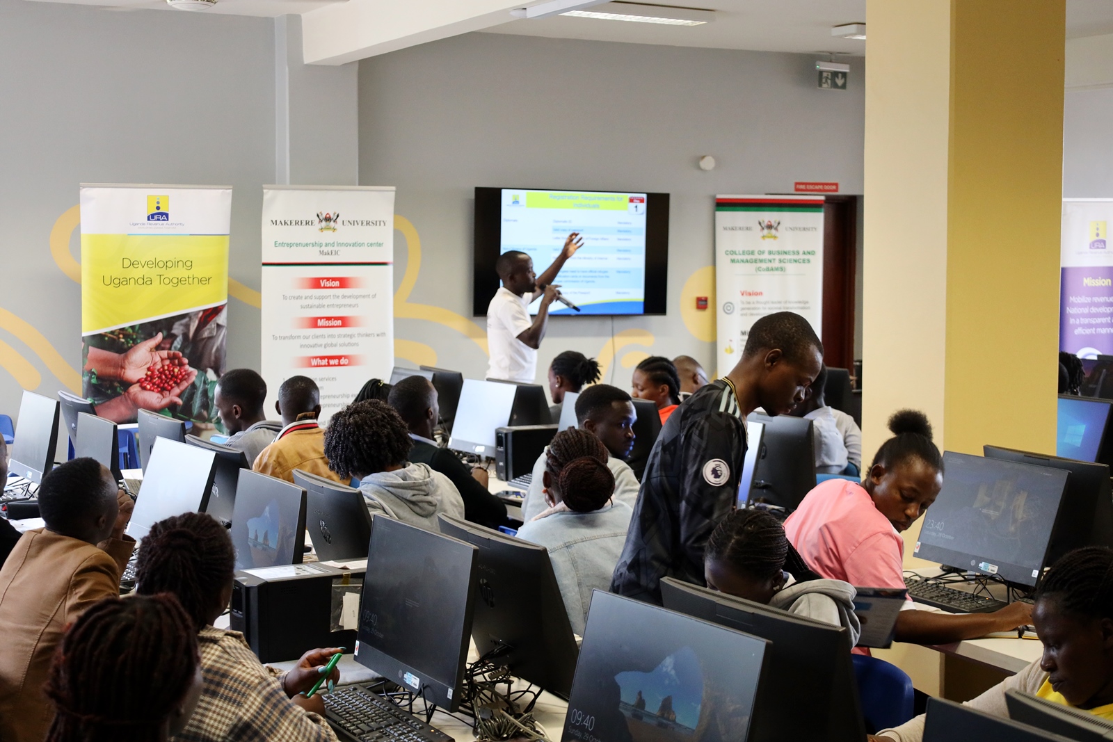 A URA official trains the students on October 30th at CoBAMS. Uganda Revenue Authority (URA) future voluntary compliant tax payers training, 600 final year students from College of Business and Management Sciences (CoBAMS), Makerere University, Kampala Uganda, East Africa 30th October 2023.