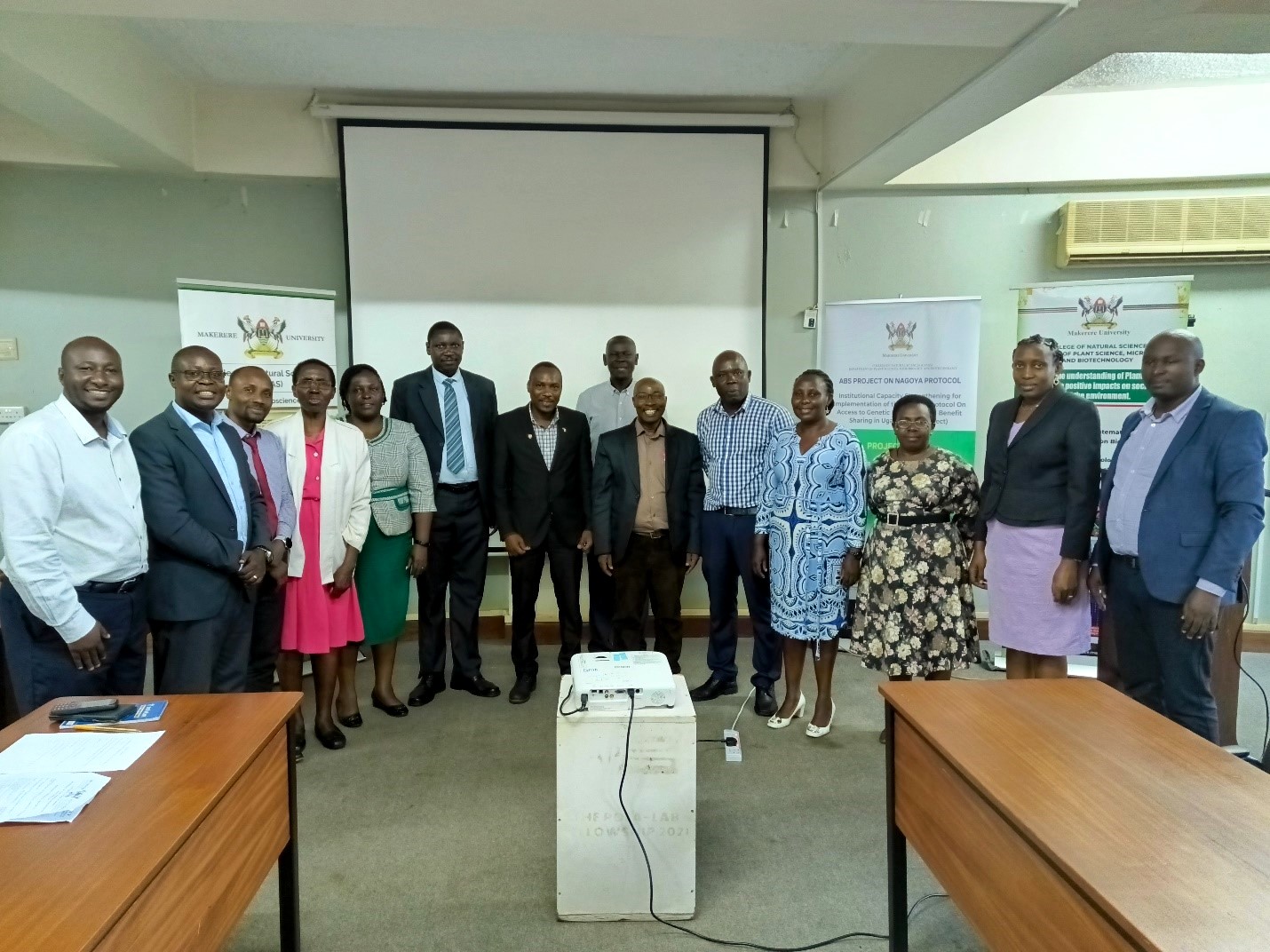 The Principal CoNAS-Prof. Tumps Ireeta (7th L), Director, Quality Assurance Directorate (QAD)-Dr. Cyprian Misinde (6th L), Dean, School of Biosciences-Prof. Arthur Kajungu Tugume (6th R), Project PI at Makerere University-Dr. Katuura Esther (4th R) and other officials at the Inception Workshop for the ABS Project on 7th November 2023 in the Telepresence Centre. Senate Building, Makerere University, Kampala Uganda, East Africa.