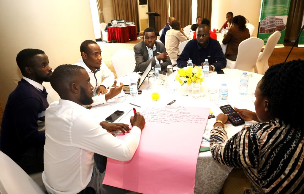 Some of the participants engaged in group discussions. Makerere EfD Stakeholders Meeting, Transitioning from Biomass to Clean Energy Sources, 17th November 2023, Kampala Sheraton Hotel, Uganda, East Africa.