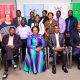 Front Row: Ag. Vice Chancellor-Prof. Umar Kakumba (2nd R), UNISA Head of Delegation-Prof. Tennyson Mgutshini (R), Prof. Thenjiwe Meyiwa (C), Dr. Maxwell Otim Onapa (L) and other leaders from Makerere and UNISA pose for a group photo after the meeting on 2nd November 2023, Telepresence Centre, Senate Building, Makerere University. Kampala Uganda, East Africa.