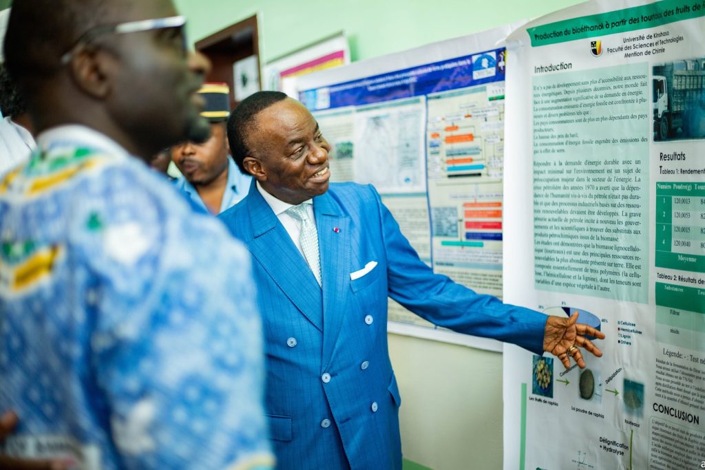Professor Jacques Fame Ndongo, Cameroon's Minister of State, Minister of Higher Education, viewing some of the posters that were presented by participants at the 19th RUFORUM Annual General Meeting in Yaoundé, Cameroon.