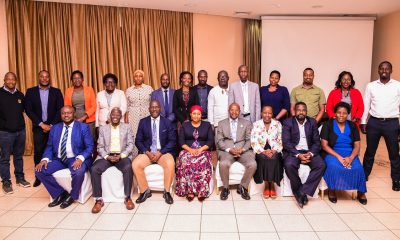 Director, Mak DRGT Prof. Edward Bbaale (Seated 4th Right) flanked by Prof. Laura Orobia (Left) from MUBS at a breakfast meeting with representatives from Colleges and the Systems Development Team on Tuesday 5th December 2023 in Kampala.