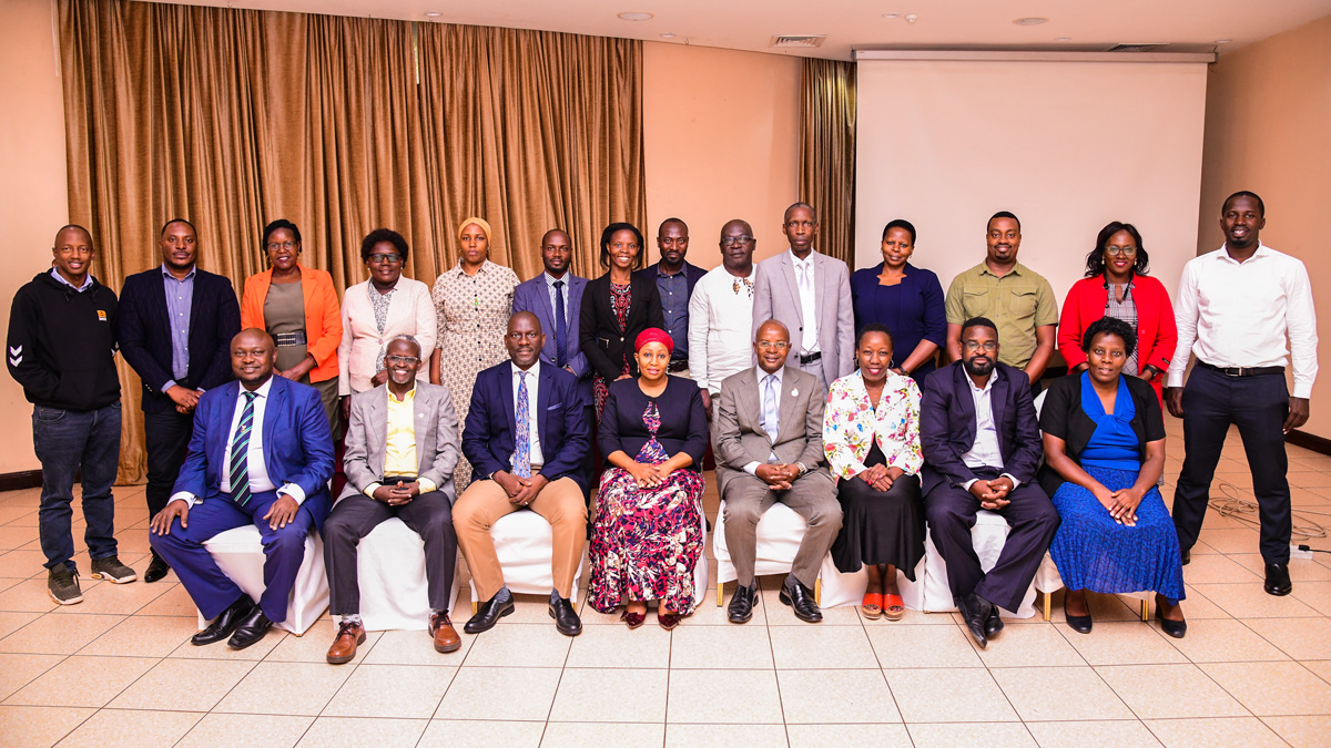 Director, Mak DRGT Prof. Edward Bbaale (Seated 4th Right) flanked by Prof. Laura Orobia (Left) from MUBS at a breakfast meeting with representatives from Colleges and the Systems Development Team on Tuesday 5th December 2023 in Kampala.